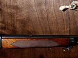 Winchester - Model 71 Deluxe, .348 Winchester. 24