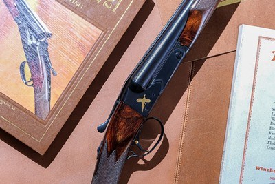 Winchester
Model 21, SxS, Factory Gold Inlay, 12ga. 26" Barrels Choked M/F. CODY LETTERED. CASE INCLUDED. MAKE OFFER.