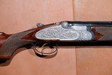 OUTSTANDING, UNUSUAL Beretta - S3EELL, O/U, Engraved by M. Slatnik, Three Barrel Set, 12ga. 28