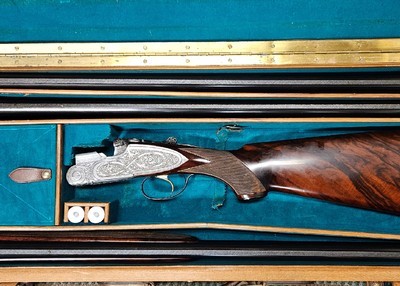 OUTSTANDING, UNUSUAL Beretta - S3EELL, O/U, Engraved by M. Slatnik, Three Barrel Set, 12ga. 28