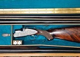 OUTSTANDING, UNUSUAL Beretta - S3EELL, O/U, Engraved by M. Slatnik, Three Barrel Set, 12ga. 28