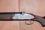 OUTSTANDING, UNUSUAL Beretta - S3EELL, O/U, Engraved by M. Slatnik, Three Barrel Set, 12ga. 28