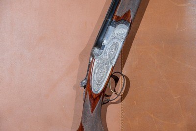 OUTSTANDING, UNUSUAL Beretta - S3EELL, O/U, Engraved by M. Slatnik, Three Barrel Set, 12ga. 28