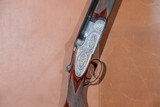 OUTSTANDING, UNUSUAL Beretta - S3EELL, O/U, Engraved by M. Slatnik, Three Barrel Set, 12ga. 28