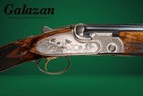 CSMC - A10, O/U Sidelock, Platinum, 12ga. 26” Barrels with Screw-in Choke Tubes. MAKE OFFER. - Image 1 of 16