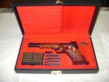 Browning Medalist 22LR with case and weights and ammo - 1 of 16