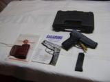 Sig Sauer P239 9MM with case and carry holster - 1 of 11