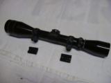 Leupold 3X9 Scope with rangefinder and mounts - 1 of 9