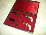 Butler Derringers 4 Gun Set New & Unfired in Case - 1 of 3