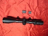 Weaver 3-9X40MM Scope with Weaver see thru rings and mounts - 1 of 9