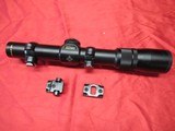 Nikon Monarch UCC 1.5-4.5X20 scope with rings and mounts - 1 of 8