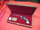 Colt Peacemaker Buntline 2nd Amendment 22 with Walnut Case - 1 of 14