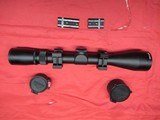 Weaver 3-9X40MM Scope with rings & mounts & flip up lense covers - 8 of 9