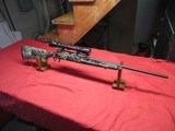 Savage Axis 243 Cammo with Bushnell Scope - 1 of 18