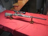 Remington 700 6.5 Creedmoor with Nikon Tactical 2233X9 Scope - 1 of 17