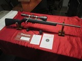 Savage Mod 93R17 17 HMR SS with Simmons 6-18 Scope - 1 of 23