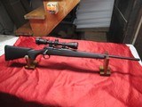 Remington 700 ADL Synthetic 6.5 CR with Vortex Scope - 1 of 16