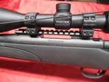 Remington 700 ADL Synthetic 6.5 CR with Vortex Scope - 14 of 16