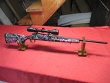 Savage Axis Muddy Girl 243 with Scope - 1 of 19