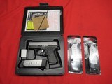 Kahr PM40 40S&W with Case and 4 Mags - 1 of 8