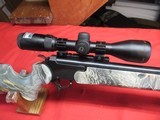 Thompson Center Encore 209X50 Camo with Nikon Scope - 2 of 20