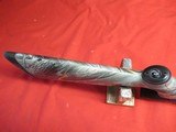 Thompson Center Encore 209X50 Camo with Nikon Scope - 11 of 20