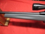 Remington 597 22 Long Rifle with Scope - 14 of 17
