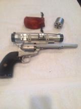 Freedom Arms 252 Casull
22 LR / 22 Mag in 7.5" Barrel w/ Nikon Scope, 2 interchangeable cylinders - 16 of 16