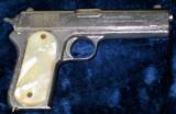 Colt 1903 .38 ACP, Nickel-plated with Pearl Grips - 1 of 11