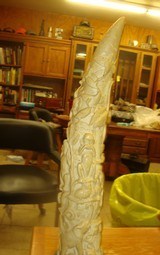 VINTAGE VERY OLD ELEPHANT TUSK ON A BASE 10 INCHES DIA. AT BASE 16 INCHES LONG COMPLETELY CARVED - 4 of 8