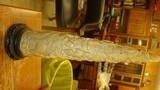 VINTAGE VERY OLD ELEPHANT TUSK ON A BASE 10 INCHES DIA. AT BASE 16 INCHES LONG COMPLETELY CARVED - 1 of 8