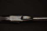 Thomas Newton of Manchester scroll-back action boxlock ejector
- 4 of 10