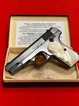 JOHN WICK: CHAPTER 3 PARABELLUM COLLECTOR GRADE 1903 COLT HAMMERLESS .32 AUTOMATIC MOTHER-OF-PEARL GRIPS, 1919 - 1 of 7