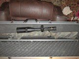 Remington 700 Bull Barrel 308 Caliber, 10x56 Government Model Scope - 1 of 6