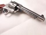 One Pair of "Taylors and Company" Stainless Steel .45LC 5 1/2" SAA Engraved Pistols! - 3 of 13
