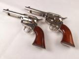 One Pair of Uberti Cattleman 5 1/2" Single Action Army Pistols in Nickel Finish! - 1 of 9