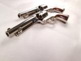 One Pair of Uberti Cattleman 5 1/2" Single Action Army Pistols in Nickel Finish! - 9 of 9