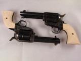 One Pair of Uberti Cattleman First Issue 4 3/4" .44-40 Single Action Army Pistols in Case Hardened Blue Finish! - 1 of 9