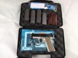 Kimber Pro Carry II .45 Two-Tone Semi-Auto with Magwell and Extras - 1 of 15