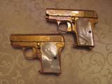 Pair of SPANISH colt 1918 BRONCO Gold Plated and Factory Engraved 7.65 Pistols - 1 of 5