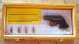 From a mid-west sale, a Antique 32 rim fire cal. Remington Elliot ring trigger 4 Barrel Pepper Box Deringer in a glass front Presentation case