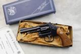 Excellent Smith and Wesson model 15-4 38 spl 4 inch revolver w/ box - 1 of 15