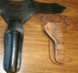 SINGLE ACTION- COWBOY ACTION HOLSTER,BELTS,
BOTH MEASURE 40 INCHES TIP TO TIP - 2 of 2