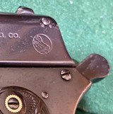 COLT = 1902 = 38 RIMLESS = Very Early made date == MILITARY Model = BLUED, Refreshed = All original = Forward Nail File Serration on Slide = - 11 of 12