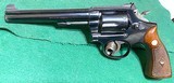 Model 14
(true 14 no dash)
SMITH & WESSON = MADE 1957 = 98% over all condition = .38 Special = Box, Tools & Papers = Both Single and Double - 2 of 14