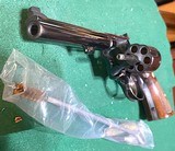 Model 14
(true 14 no dash)
SMITH & WESSON = MADE 1957 = 98% over all condition = .38 Special = Box, Tools & Papers = Both Single and Double - 8 of 14