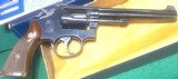 Model 14
(true 14 no dash)
SMITH & WESSON = MADE 1957 = 98% over all condition = .38 Special = Box, Tools & Papers = Both Single and Double - 5 of 14