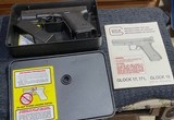 GLOCK 19 X 19 LUGER = TUPPERWARE BOX = MANUAL = TWO MAGAZINES , LOADER == Believed to be NEW OLD STOCK = 1993 MARKED - 1 of 17