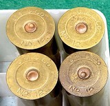 BRASS = 12 GAUGE SHELLS = EMPTY = True age unknown = Used in U.S. Military in the World wars == Free shipping - 3 of 4