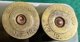 BRASS = 12 GAUGE SHELLS = EMPTY = True age unknown = Used in U.S. Military in the World wars == Free shipping - 4 of 4